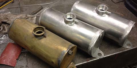 Image of These alloy header tanks were copied from the brass original